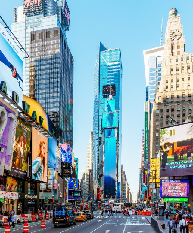 Crowded Times Square on a sunny morning, New York City